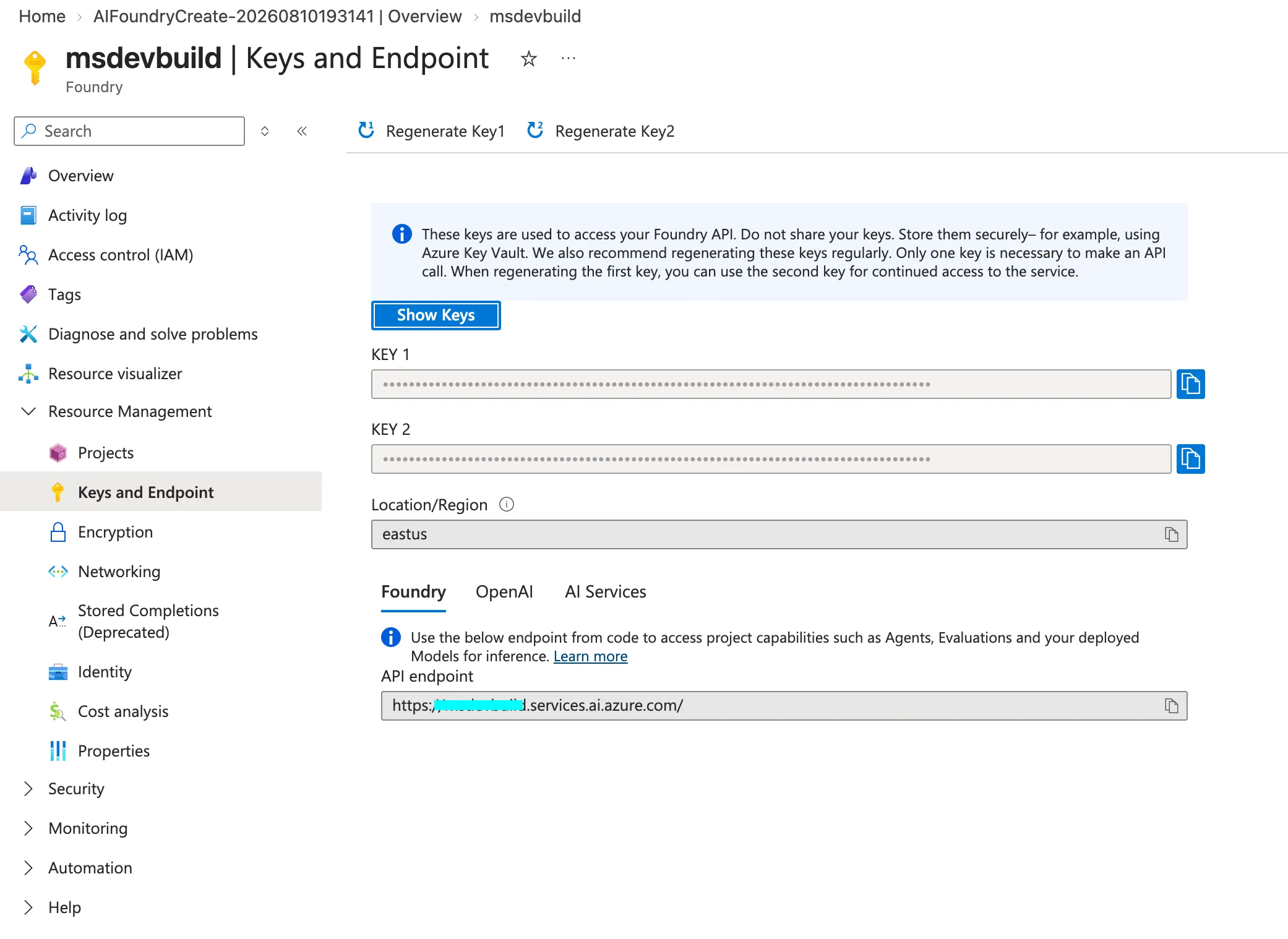 The Keys and Endpoint page of a Foundry resource in the Azure portal, showing Key 1, Key 2, the region, and the Foundry API endpoint under tabs for Foundry, OpenAI and AI Services